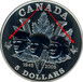 Ilustración de las diferencia de la moneda 5 Dólares de Plata "60 Aniversario Victoria Segunda Guerra Mundial - Veteranos" 2005 KM# 556.2