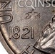 Ilustración de las diferencia de la moneda Medio dólar de plata "Missouri Centennial" 1921 KM# 149.2